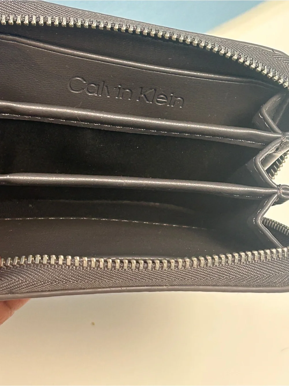 Calvin Klein gray pebbled leather zip wallet